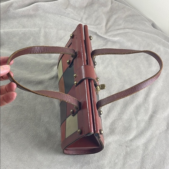 Vintage Brown Satchel with Structured Design and Metal Accents - Picture 9 of 15